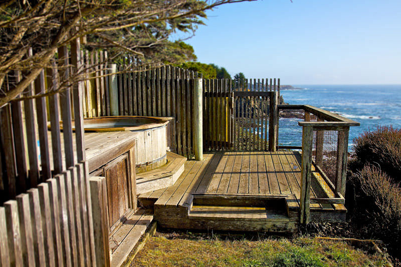 view from beside the hot tub looking south down the coast